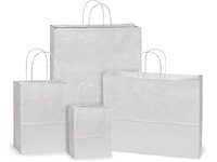 5.75 x 3.25 x 8.37 white kraft paper shopping bags have matching twisted  paper handles and squared bottom gussets. These paper bags are made with  100%